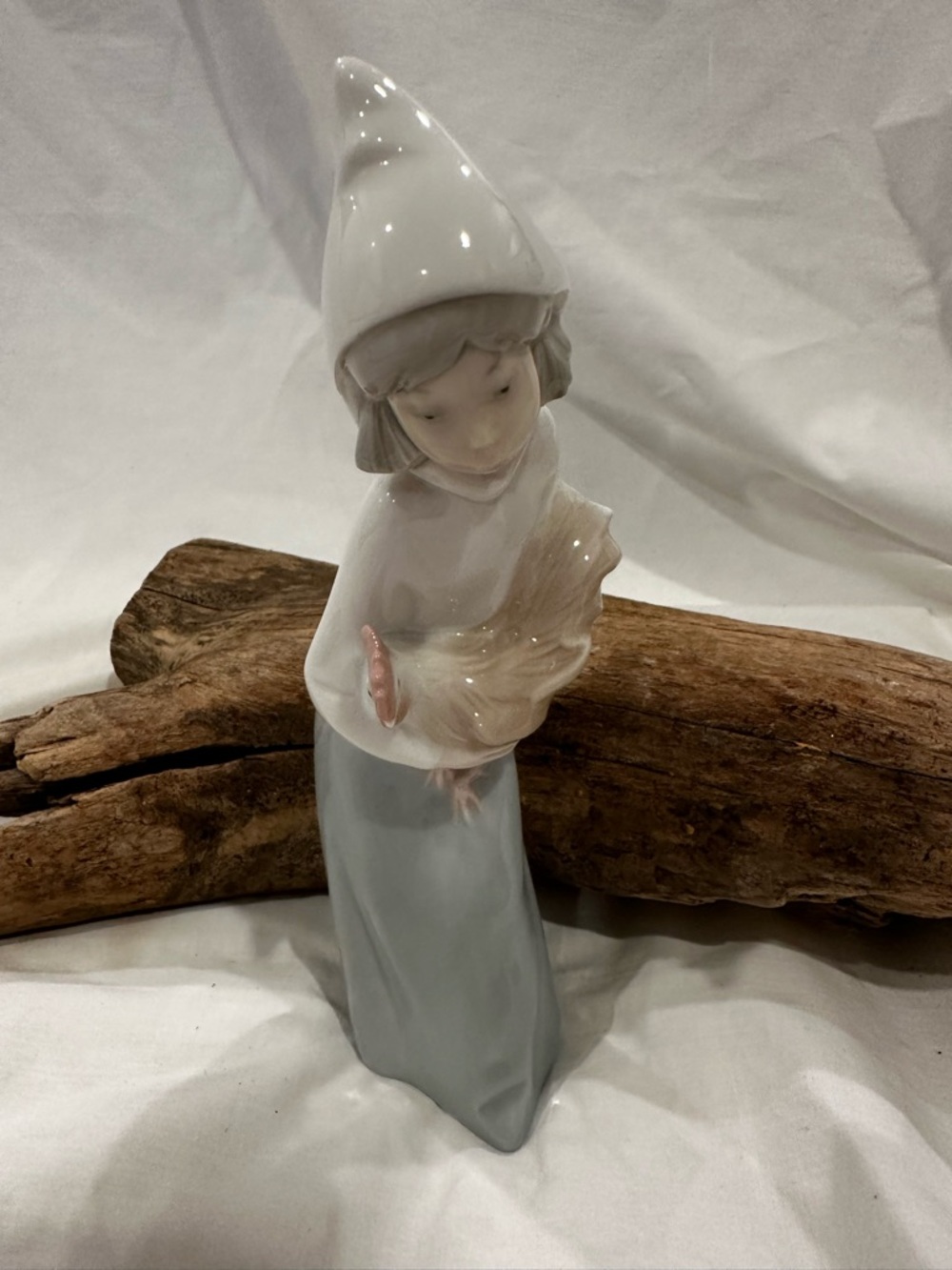 Lladró  figurine titled "Girl with Rooster" or "Shepherdess with Rooster".